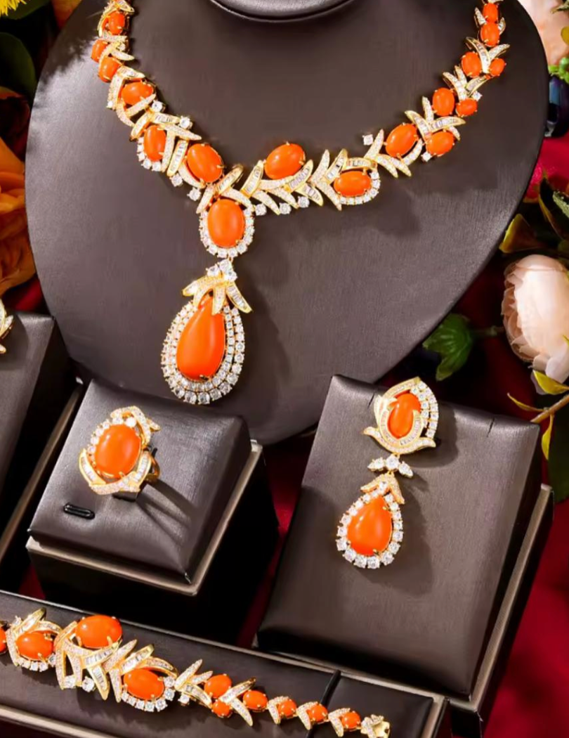 Luxury Orange and Red Coral Cabochon and Diamond Parure | 4-Piece Yellow Gold Jewelry Set